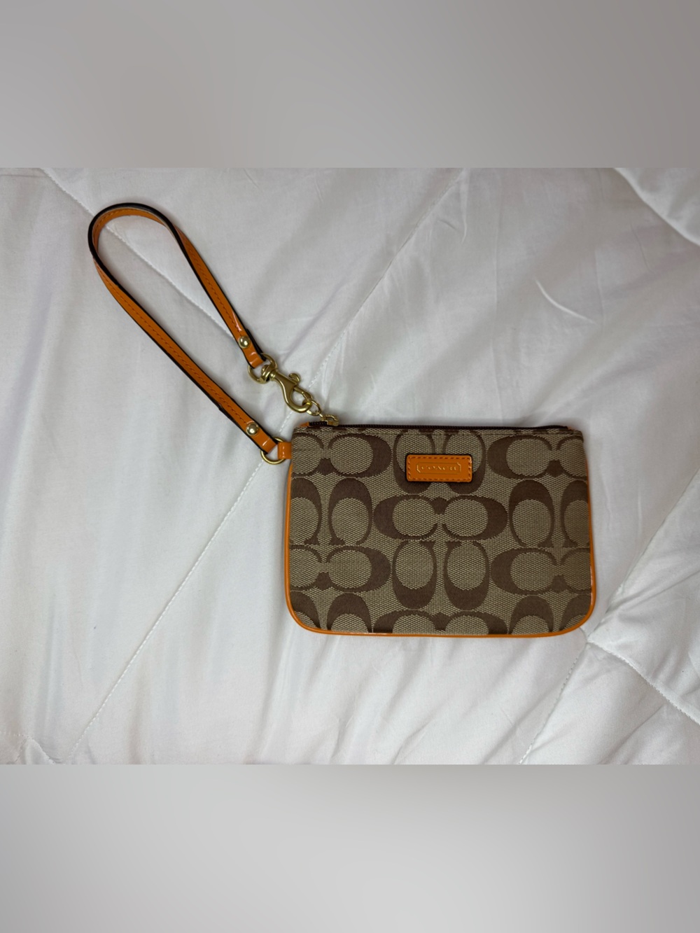 Coach Brown Signature Canvas Jacquard Wristlet with Orange Trim and Interior